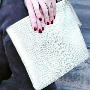 All in pouch in ivory exotic